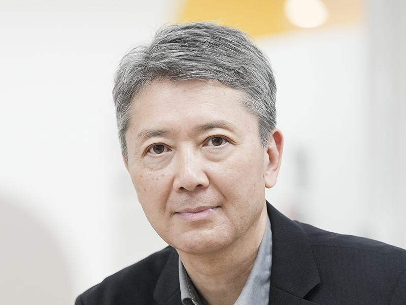 横手 拓治