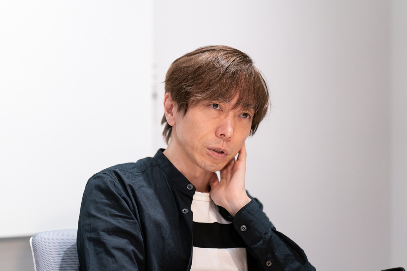 「学問をビジネスに応用するにはそのためのトレーニングが必要」と語る坂井氏
